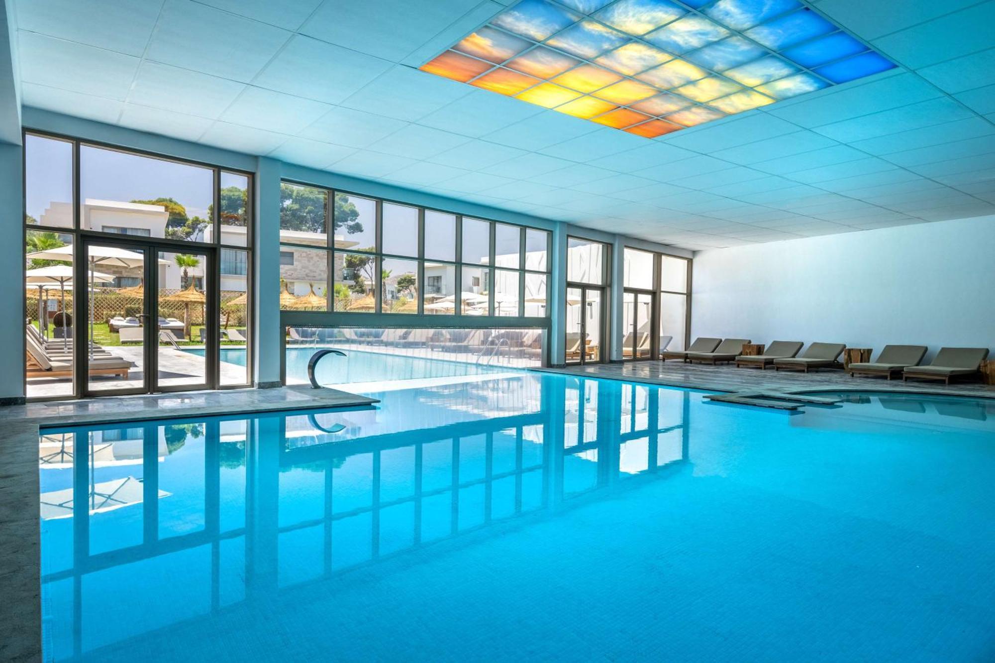 Radisson Blu Resort Al Hoceima Al Hoceïma Exterior foto The swimming pool at the hotel